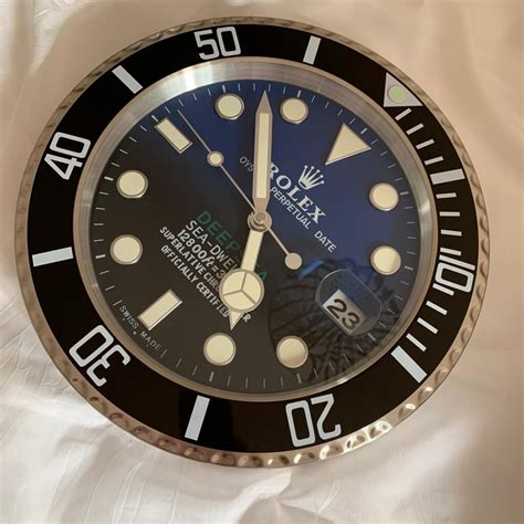 rolex wanduhr um den bauch|Rolex submariner taucher.